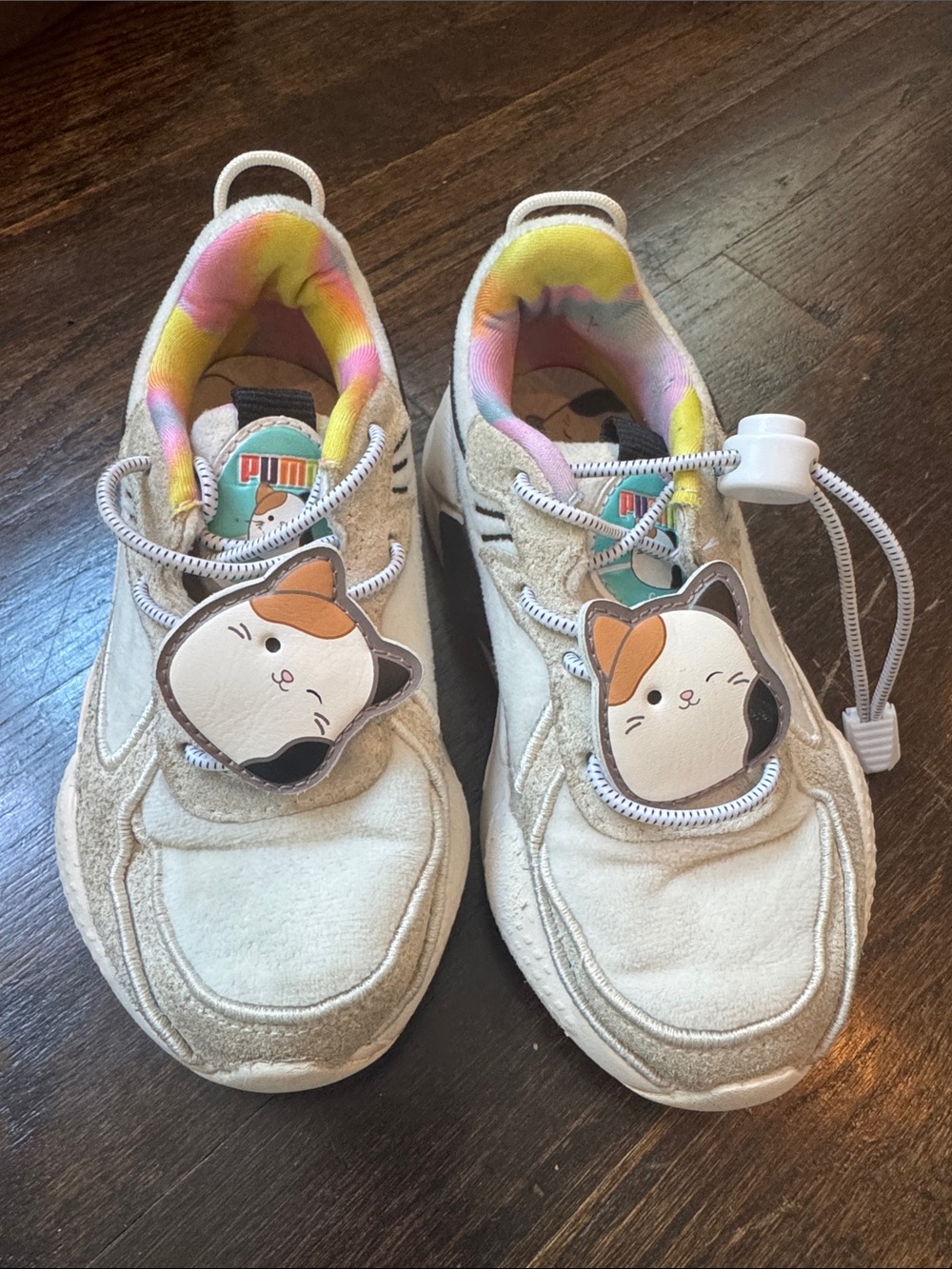 Puma Kids White Sneakers with Pink and Yellow Tie-Dye Lining and Cat Charms